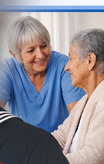 Certified Nursing Assistant supporting an elderly patient